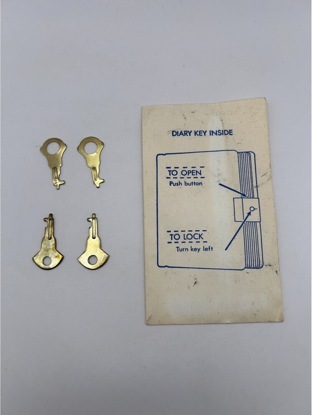 vintage diary keys with instruction slip lock mid-century
